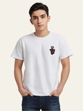 Man wearing a white t-shirt with a colorful graphic on a beige background Graphic White Drop Shoulder "Dhool" T-Shirt Royal Outfits