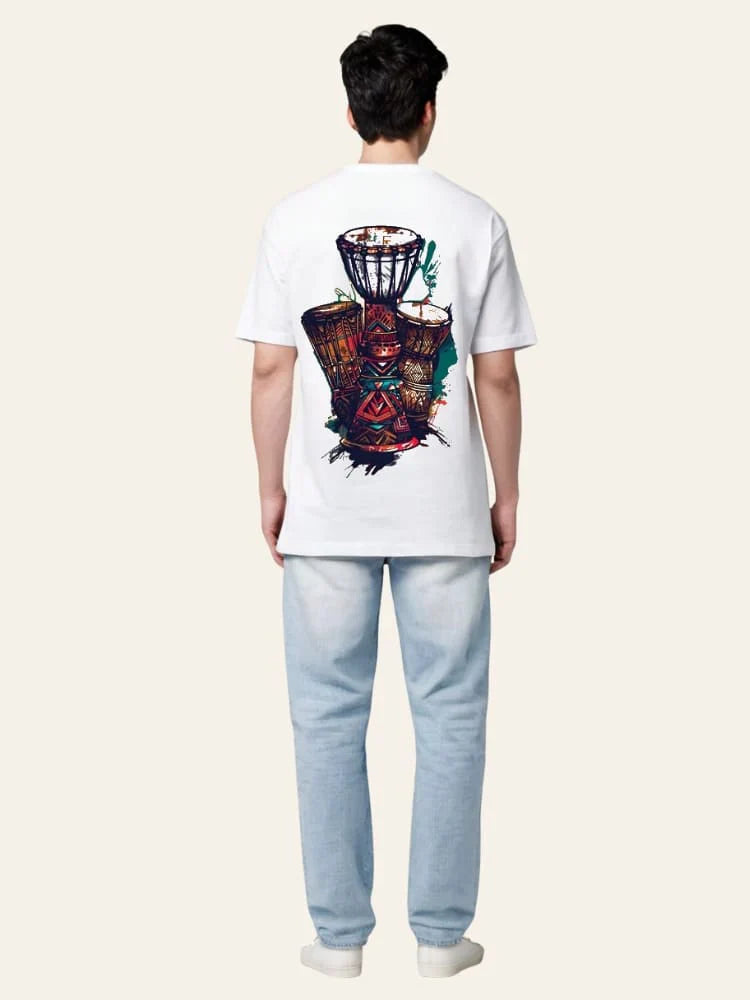 Person wearing a white t-shirt with a colorful design on the back, standing against a plain background.