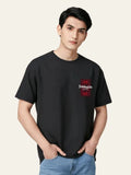 Person wearing a black t-shirt with a red logo on a plain background Graphic Black Drop Shoulder Dimension T-Shirt Royal Outfits