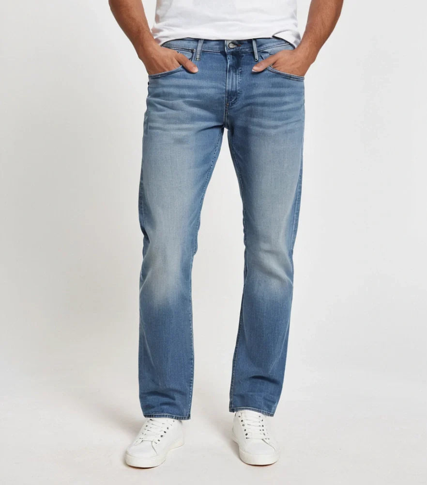 Front-facing image of faded straight-cut denim jeans styled casually on a male model - Royal Outfits