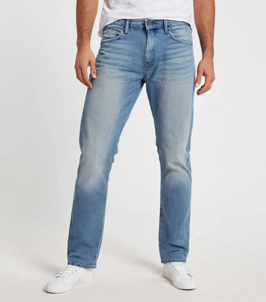 Front-facing image of faded straight-cut denim jeans styled casually on a male model - Royal Outfits