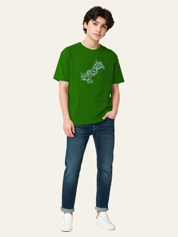 Person wearing a green t-shirt with text and blue jeans on a white background