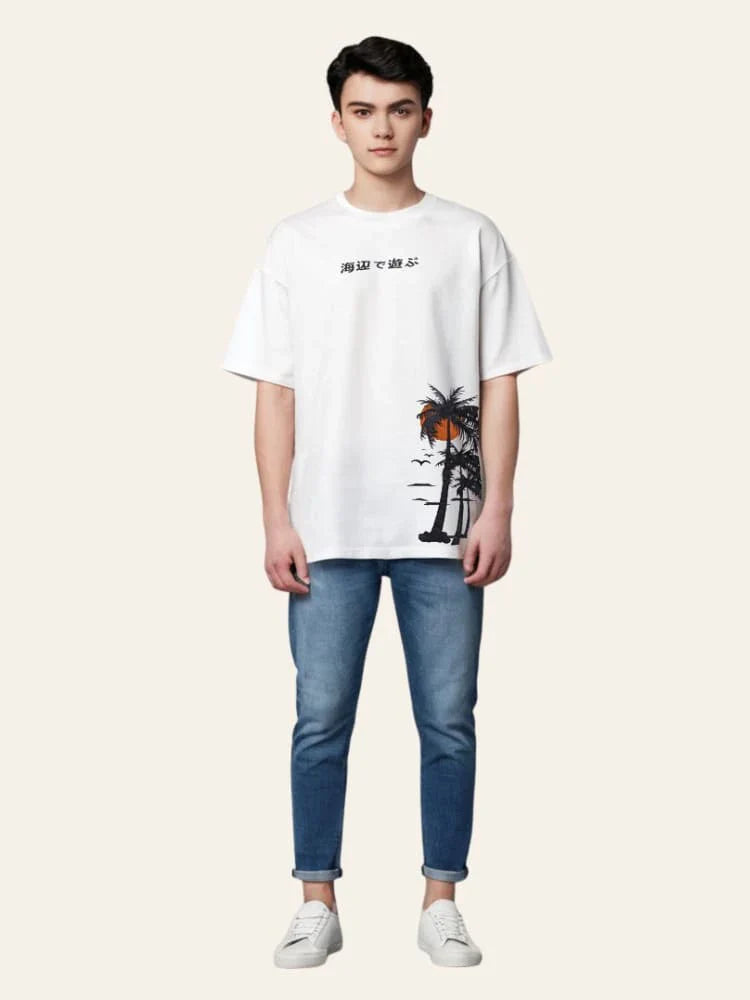 Person wearing a white t-shirt with a graphic design and blue jeans on a white background