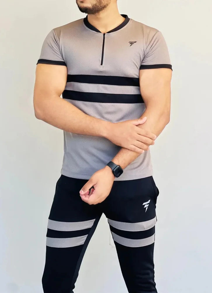 Model dressed in a beige full-sleeve track suit with a front zip and matching joggers - Royal Outfits