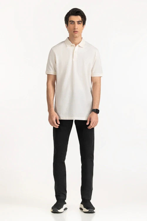 Man wearing a white polo shirt and black pants on a white background White Regular Fit Men POLO T-Shirt Royal Outfits