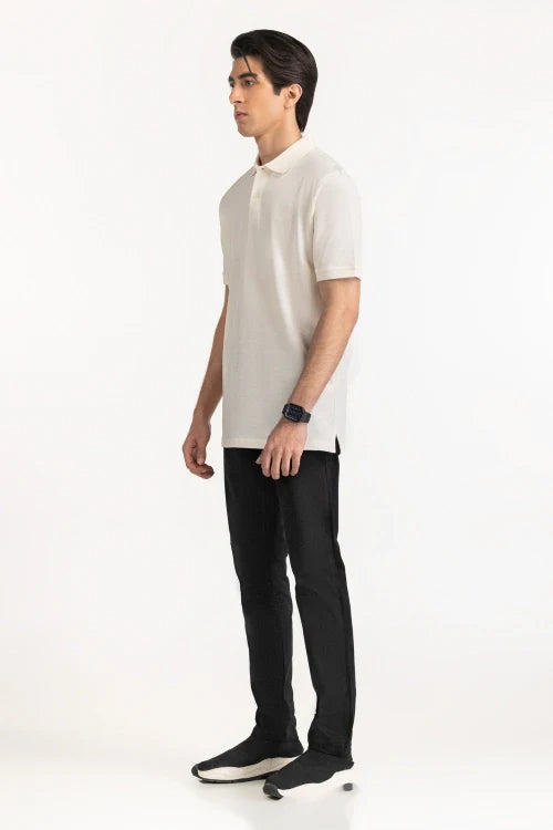 Man wearing a white polo shirt and black pants on a white background White Regular Fit Men POLO T-Shirt Royal Outfits
