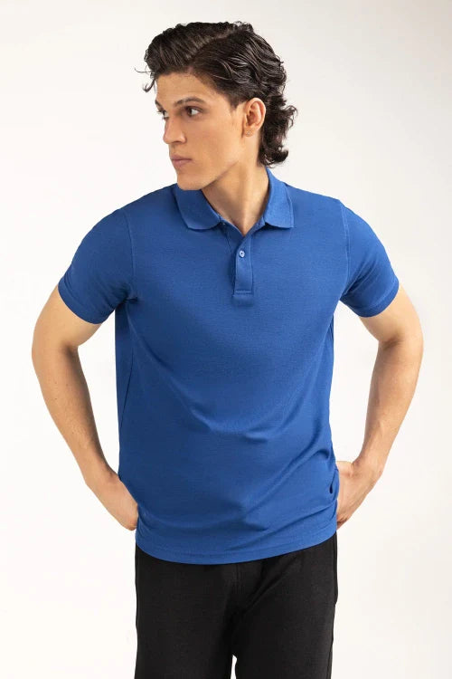 Man wearing a blue polo shirt on a white background