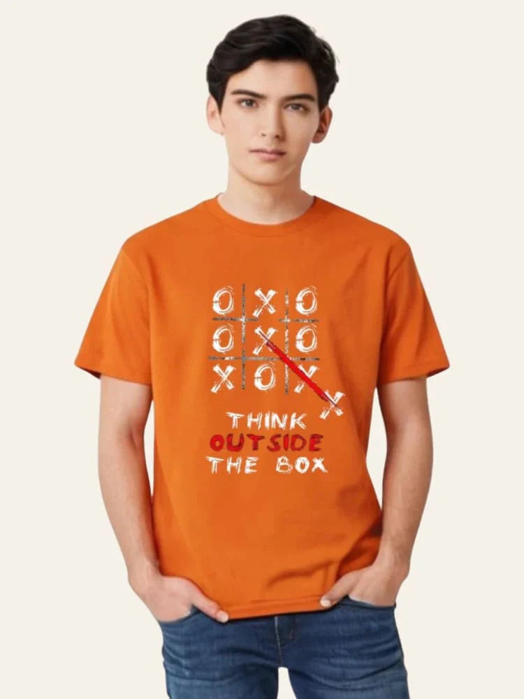 Person wearing an orange t-shirt with a motivational quote on a plain background Graphic Orange Crossword T-Shirt Royal Outfits