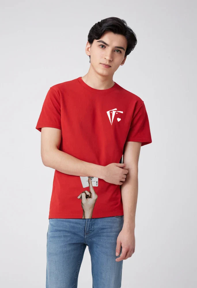 Person wearing a red t-shirt with a logo on a white background
